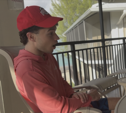 Jonathan wearing an Ohio State hat.